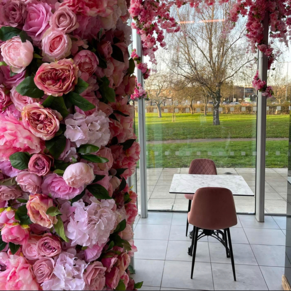 flower wall cafe decoration, pink flower wall and floral design. artificial flower wall